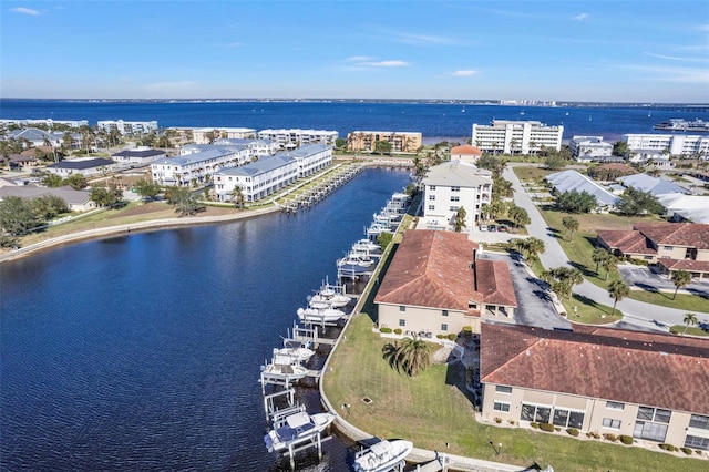 birds eye view of property featuring a water view