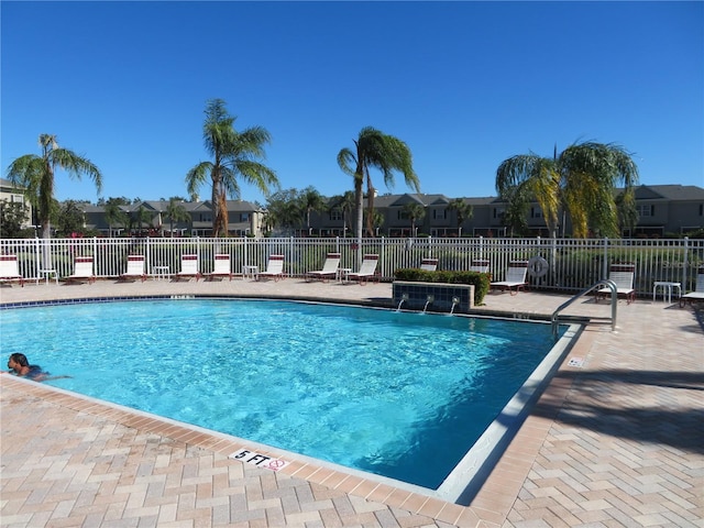 view of pool featuring a patio area