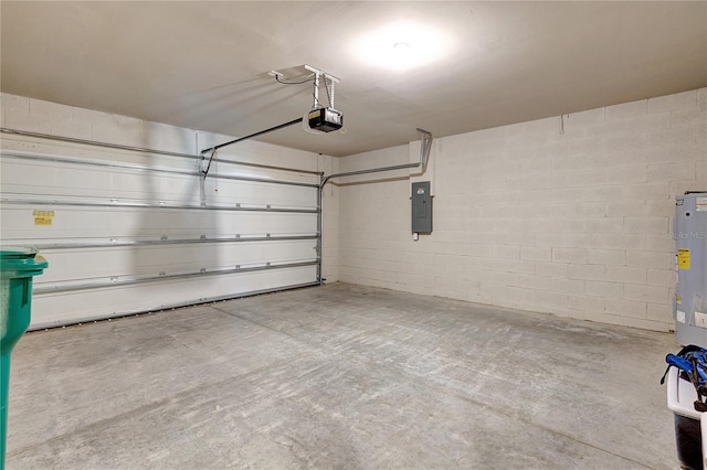 garage with electric panel and a garage door opener