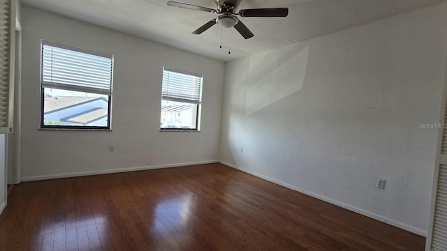 2000 Forrest Nelson Blvd Unit C8, Port Charlotte, FL 33952 - spare room featuring wood-type flooring, baseboards, and ceiling fan
