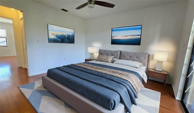 2000 Forrest Nelson Blvd Unit C8, Port Charlotte, FL 33952 - bedroom with wood finished floors and a ceiling fan