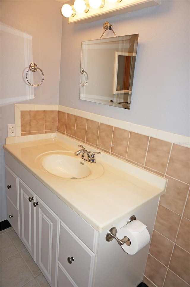 bathroom featuring tile walls, vanity, and tile patterned floors