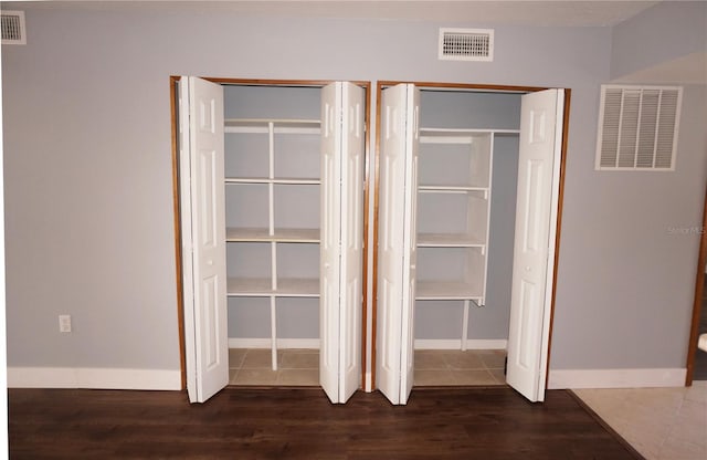 closet featuring visible vents