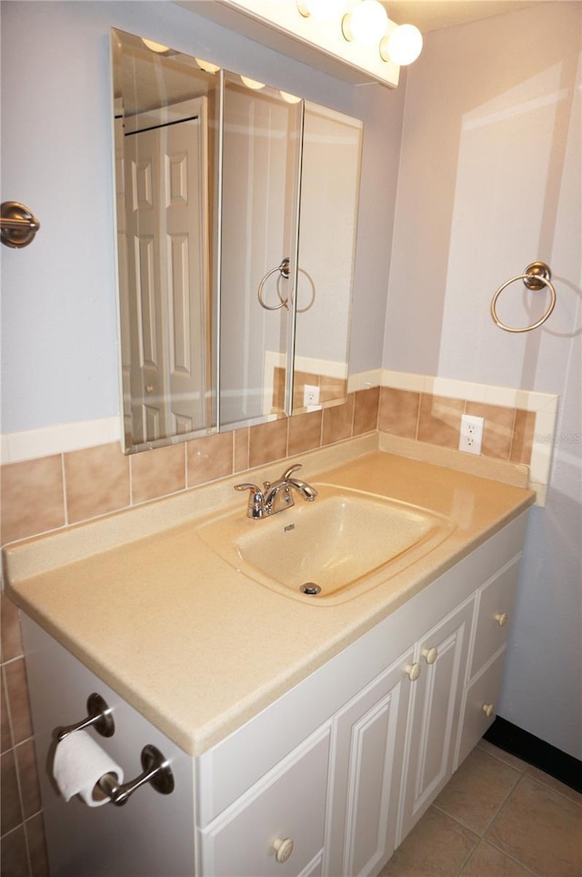 bathroom with vanity and tile patterned floors