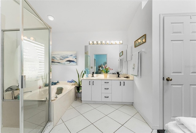 bathroom featuring tile patterned floors, vanity, and plus walk in shower