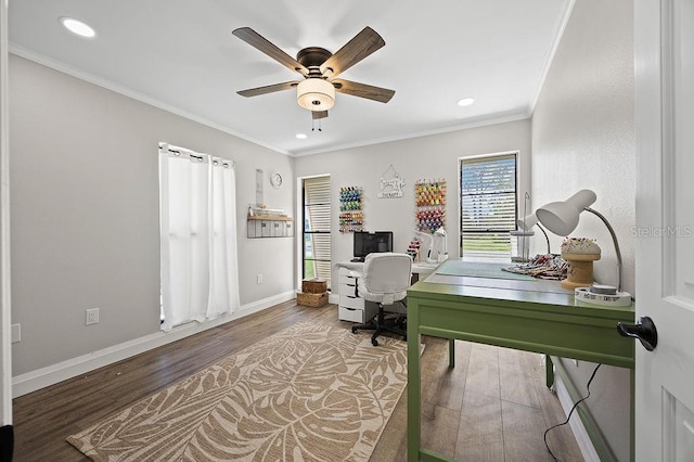 home office with hardwood / wood-style floors, ceiling fan, and crown molding