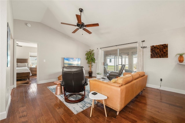 living room with dark hardwood / wood-style flooring, ceiling fan, and lofted ceiling