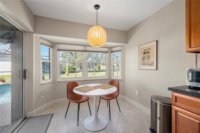 view of tiled dining space