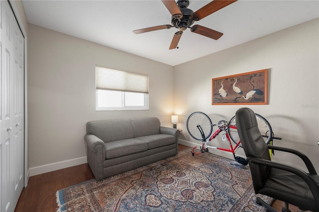 office space with dark hardwood / wood-style floors and ceiling fan