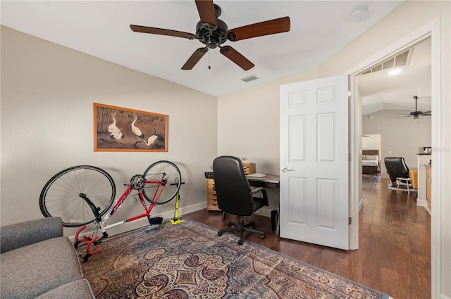 home office featuring dark wood-type flooring, ceiling fan, and lofted ceiling