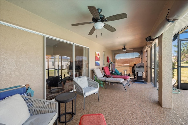 view of patio featuring ceiling fan