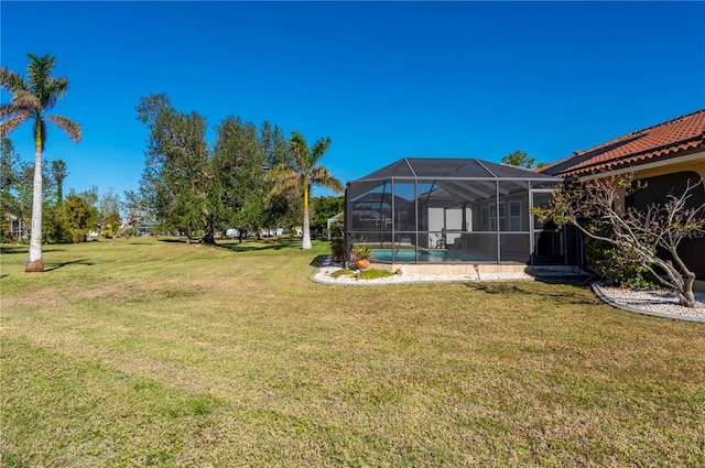 view of yard featuring a lanai