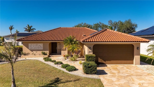 view of front facade with a garage and a front lawn