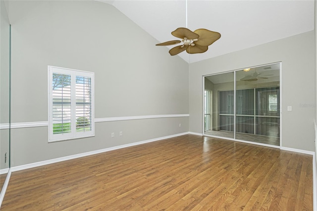 unfurnished room with wood-type flooring, high vaulted ceiling, and ceiling fan