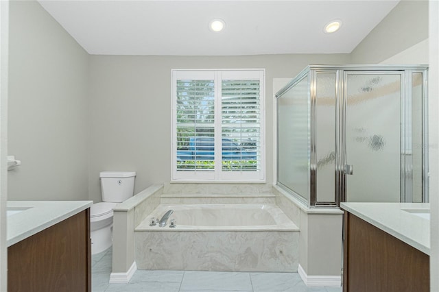 full bathroom featuring vanity, toilet, and shower with separate bathtub