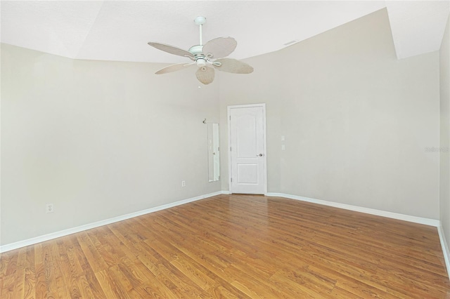 spare room with ceiling fan, high vaulted ceiling, and light hardwood / wood-style floors