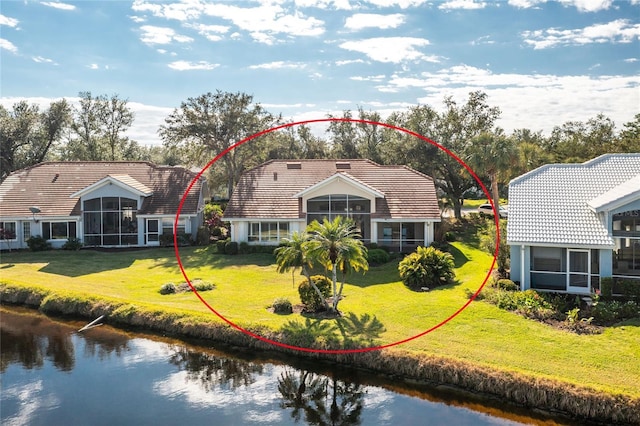 birds eye view of property featuring a water view