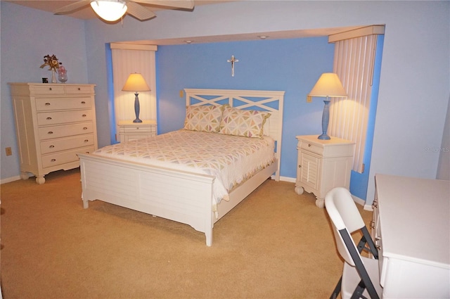 bedroom with light carpet and ceiling fan