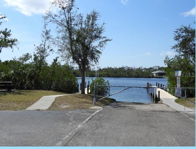 view of dock with a water view