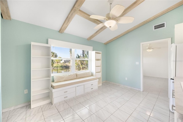 interior space with vaulted ceiling with beams and ceiling fan