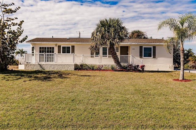 ranch-style house with a front lawn