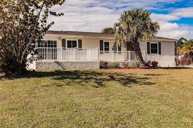 ranch-style house with a front lawn