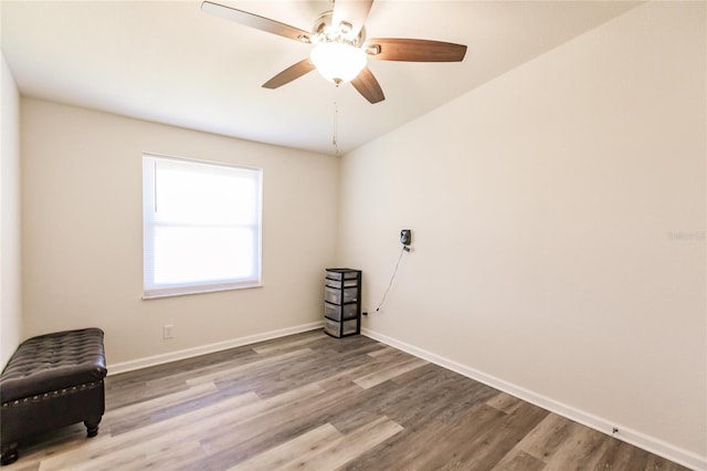 unfurnished room featuring ceiling fan and hardwood / wood-style floors