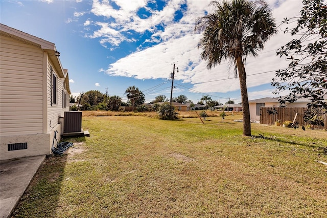 view of yard featuring central AC