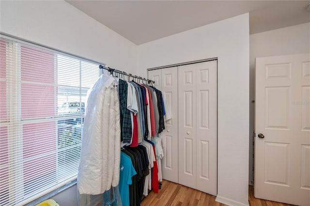 spacious closet featuring light wood-type flooring