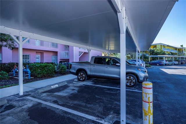 view of parking with a carport