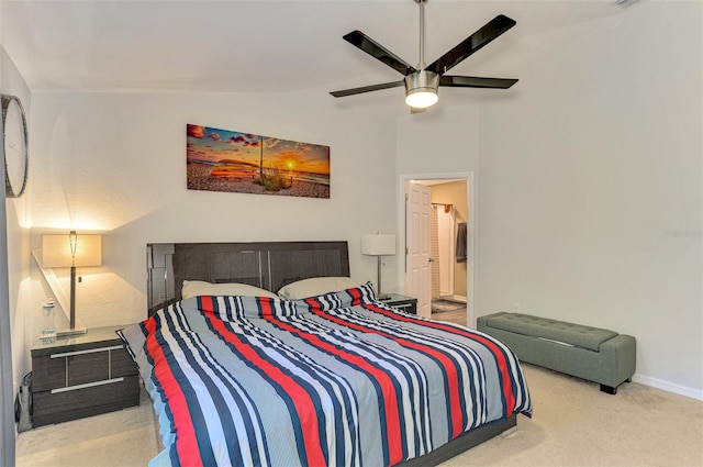 carpeted bedroom featuring ceiling fan and lofted ceiling