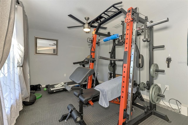 exercise room featuring ceiling fan