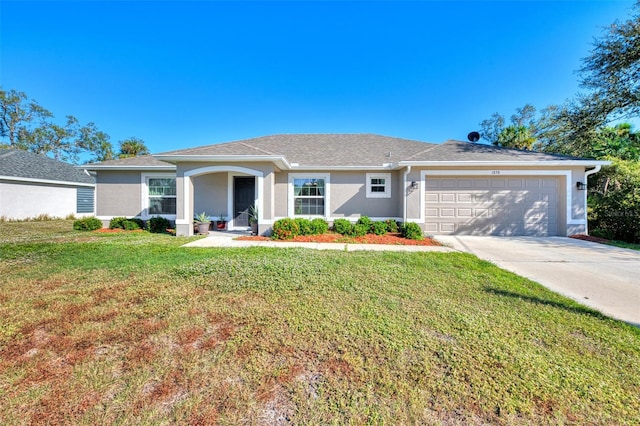 single story home featuring a front yard and a garage