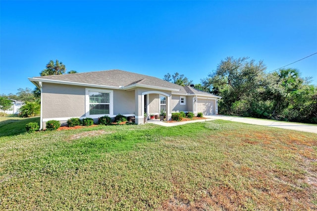 ranch-style home featuring a front yard and a garage