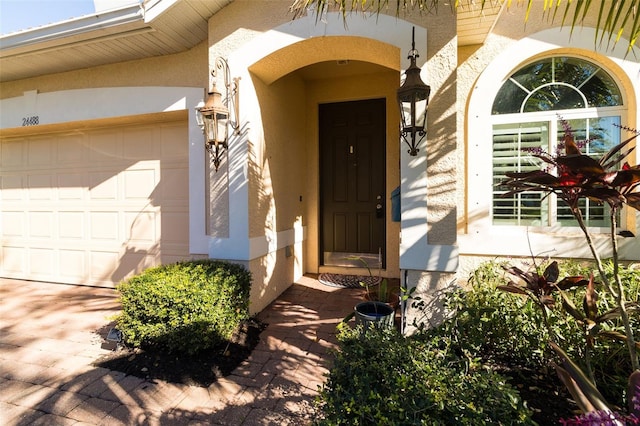 property entrance with a garage