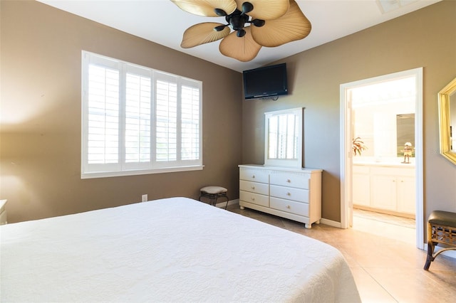 bedroom featuring connected bathroom, ceiling fan, and light tile patterned flooring