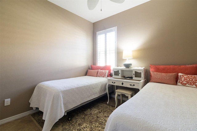 bedroom featuring ceiling fan and vaulted ceiling