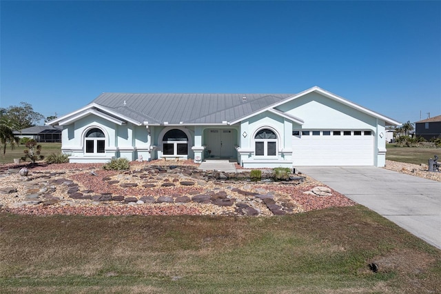 ranch-style home with a front yard and a garage