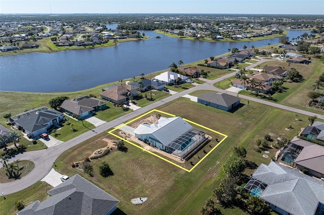 bird's eye view with a water view