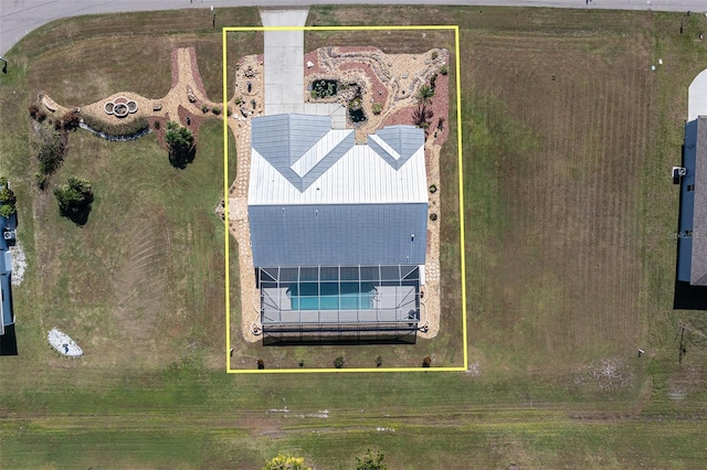 birds eye view of property featuring a rural view