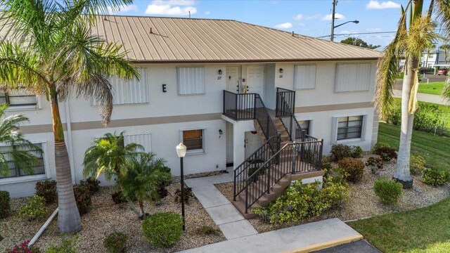 26485 Rampart Blvd Unit E7, Punta Gorda, FL 33983 - view of property featuring stairway