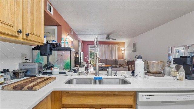26485 Rampart Blvd Unit E7, Punta Gorda, FL 33983 - kitchen featuring dishwasher, a ceiling fan, light countertops, a sink, and open floor plan