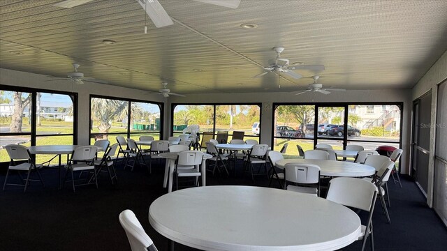 26485 Rampart Blvd Unit E7, Punta Gorda, FL 33983 - sunroom with ceiling fan, outdoor dining space, and healthy amount of natural light