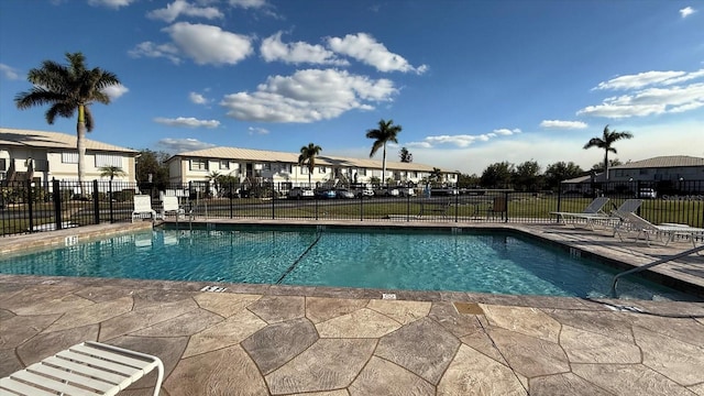 view of pool featuring a patio