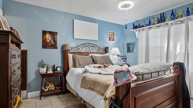 26485 Rampart Blvd Unit E7, Punta Gorda, FL 33983 - bedroom with light tile patterned floors