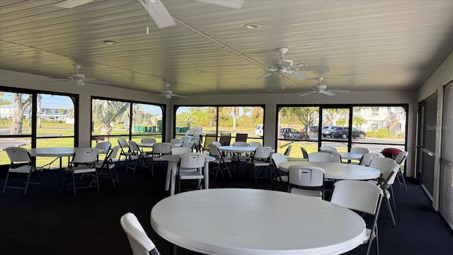 26485 Rampart Blvd Unit E7, Punta Gorda, FL 33983 - sunroom / solarium with a ceiling fan, outdoor dining space, and healthy amount of natural light