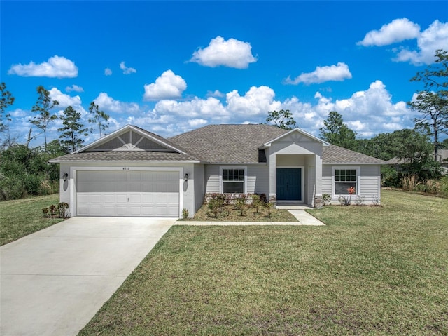 view of front facade featuring a garage and a front yard