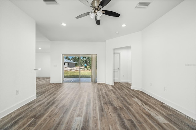 unfurnished room with ceiling fan and dark hardwood / wood-style floors