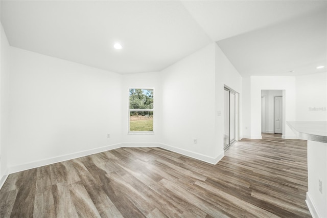 spare room featuring hardwood / wood-style floors