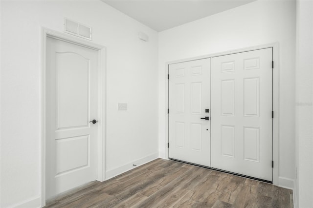 entrance foyer featuring hardwood / wood-style floors